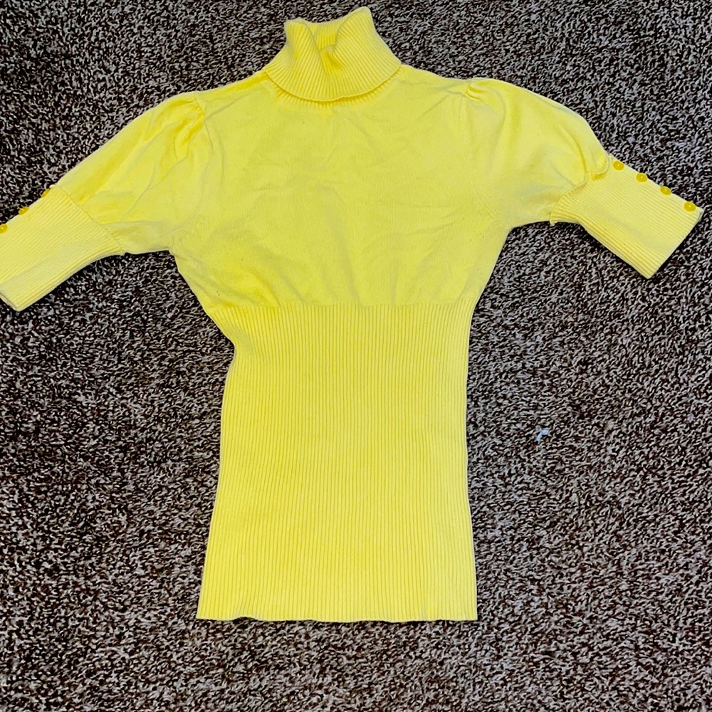 Yellow turtleneck shirt